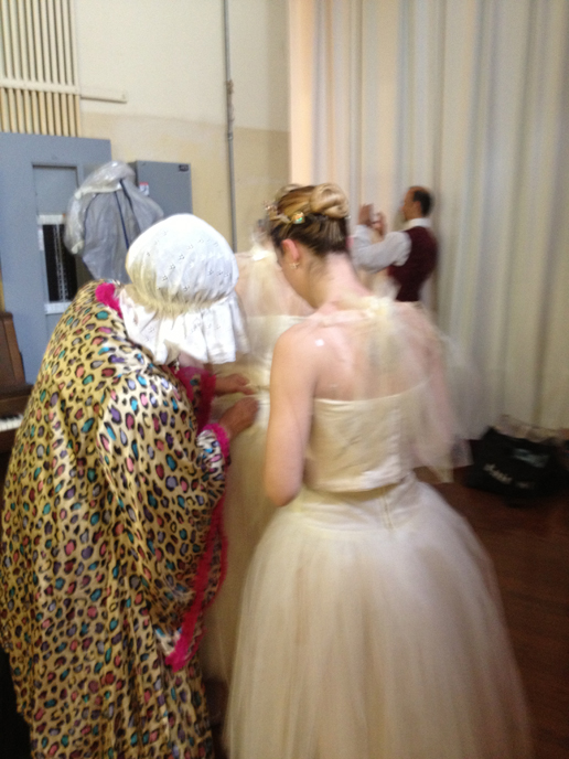 Finishing up a quick change backstage during Cinderella