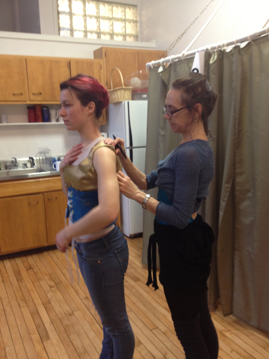 Rachel gets fitted for a new costume